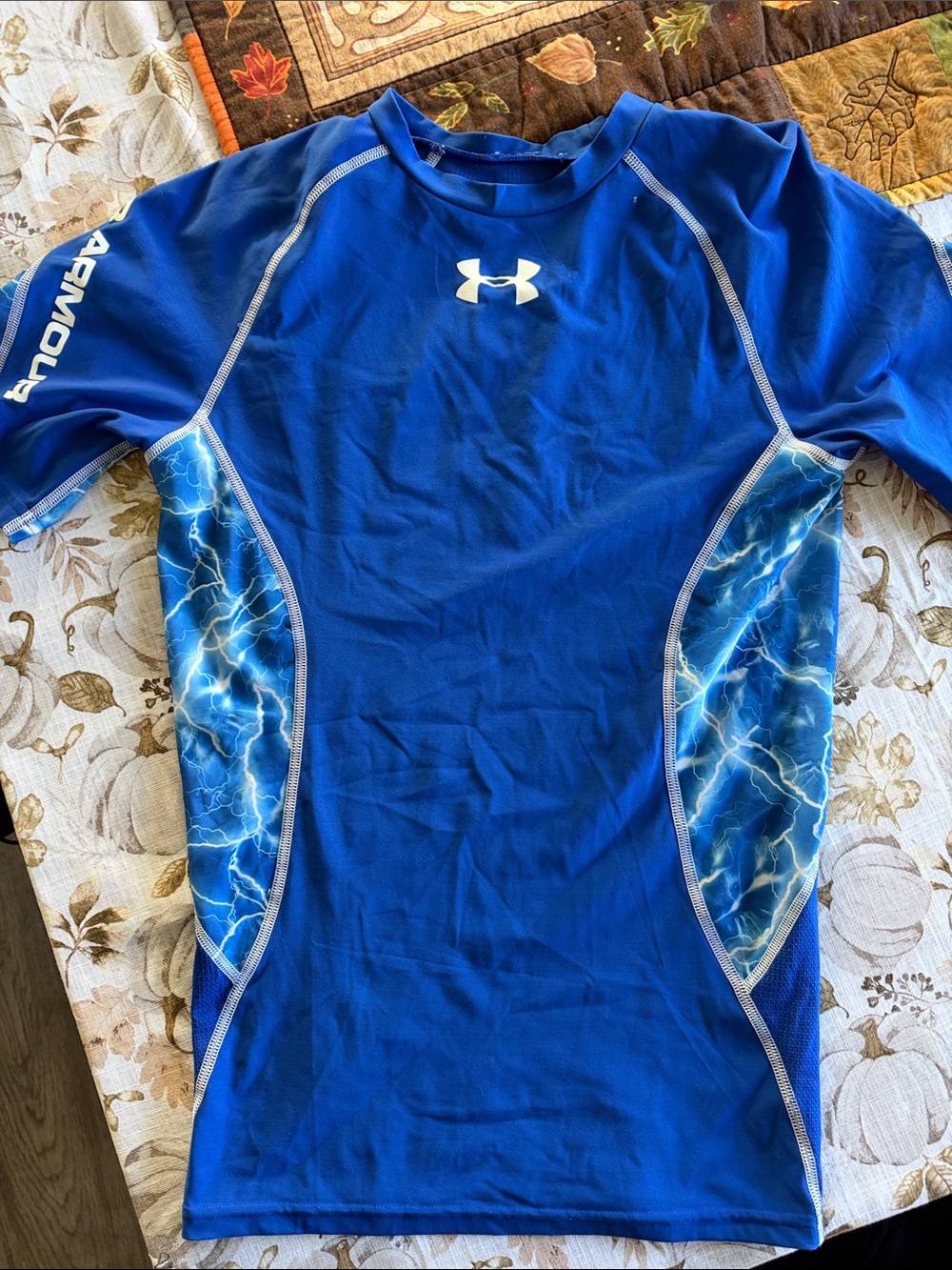 Under Armour Men’s Royal Blue Short-Sleeve Swim Rash Guard with Lightning Panels